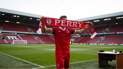 Exeter City Football Club Signs Former Shrews Midfielder Perry